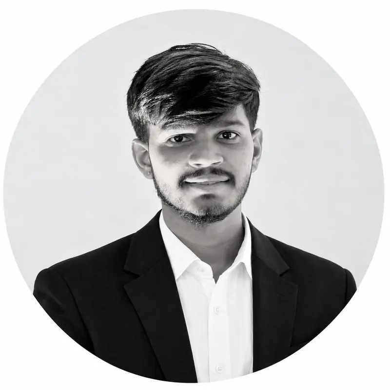 Black-and-white portrait of Harit Patel in a dark blazer and white shirt